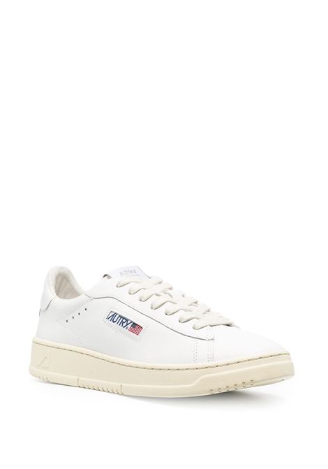 White leather Action low-top sneakers featuring Autry logo  AUTRY | ADLM-NW01WHT/WHT