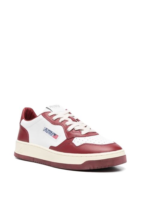 dark red and white calf leather low-top sneakers  AUTRY | AULM-WB35WHT/SYRAH
